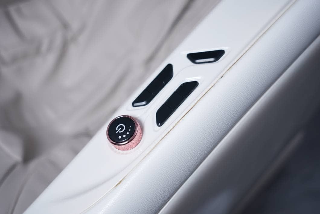 Quick-access controls on the side of the chair