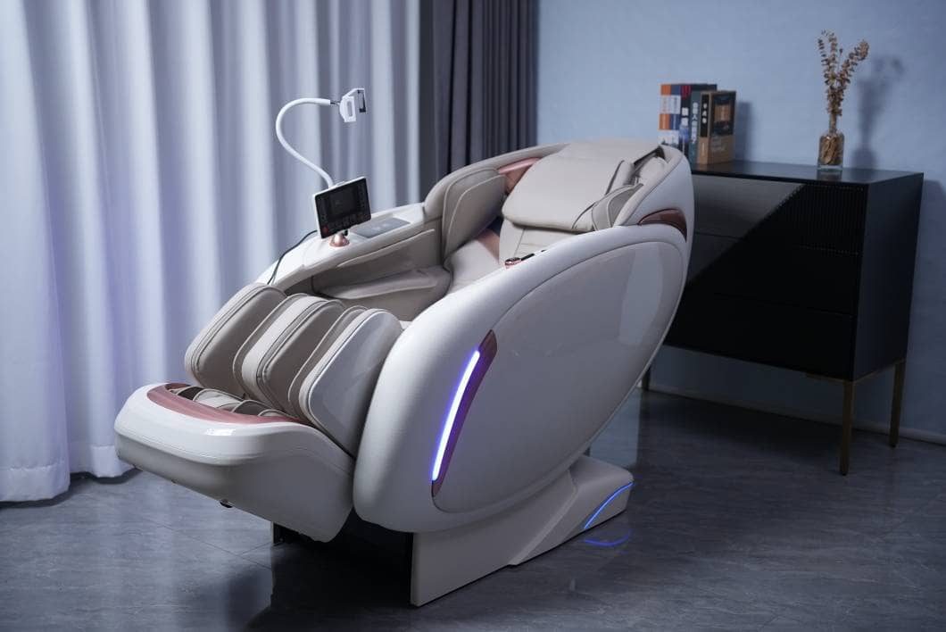 Cream and rose-gold full-body massage chair with leg rests, side LED lights and a control panel